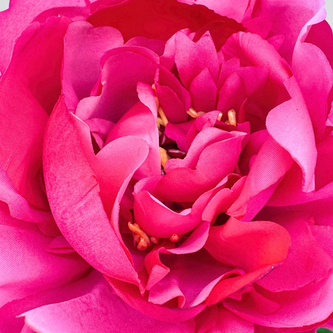 Close-up of a vibrant pink faux peony flower with detailed petals from My Faux Florist Canada