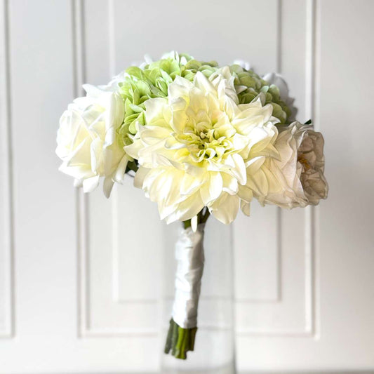 realistic artificial flower bouquet featuring white artificial roses, white artificial dahlias, and pale green artificial hydrangeas — from My Faux Florist Canada.