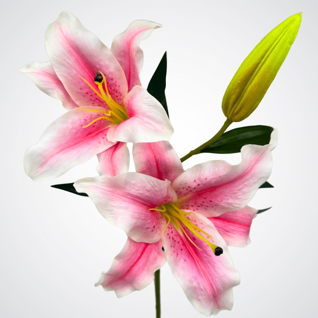 view of faux pink lilies with yellow and white centres, by Faux Florist Canada