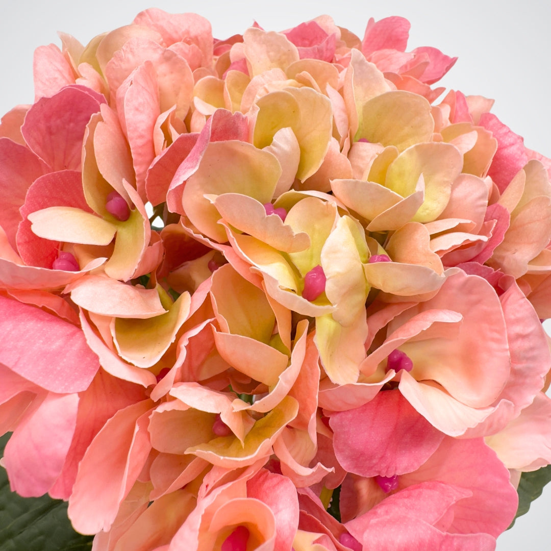 Close-up of pink and peach fake hydrangea flowers, from My Faux Florist Canada