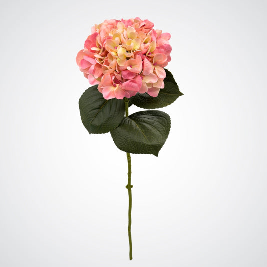 Pink artificial hydrangea flower with green leaves on a white background, from My Faux Florist Canada.