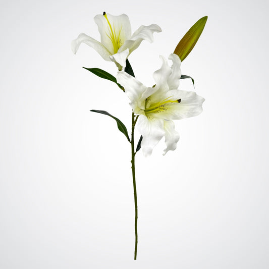 Artificial white lily flower arrangement on a light gray background