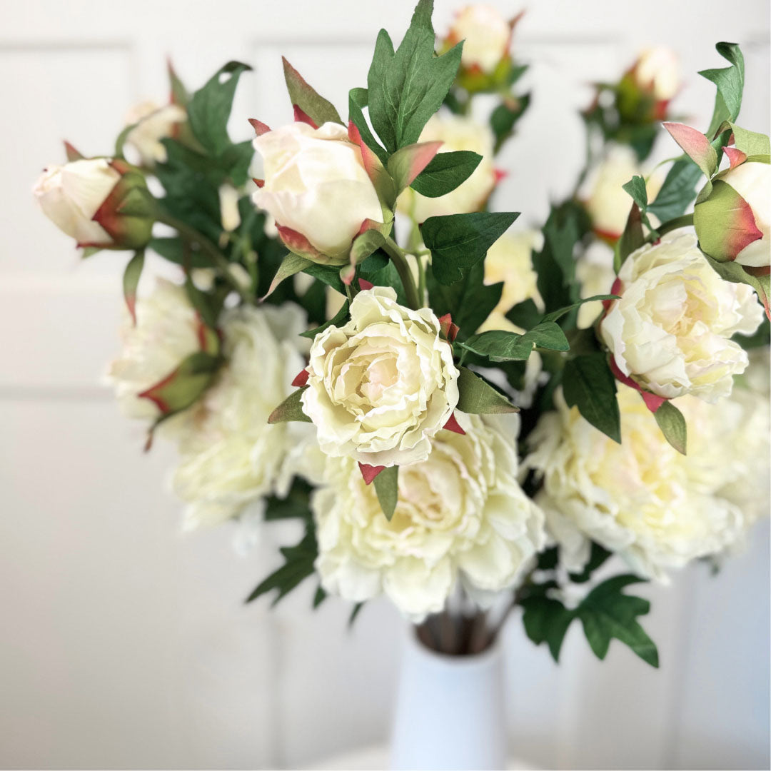Bunched ivory artificial peony stems with Real Touch finish and natural texture, by Faux Florist Canada