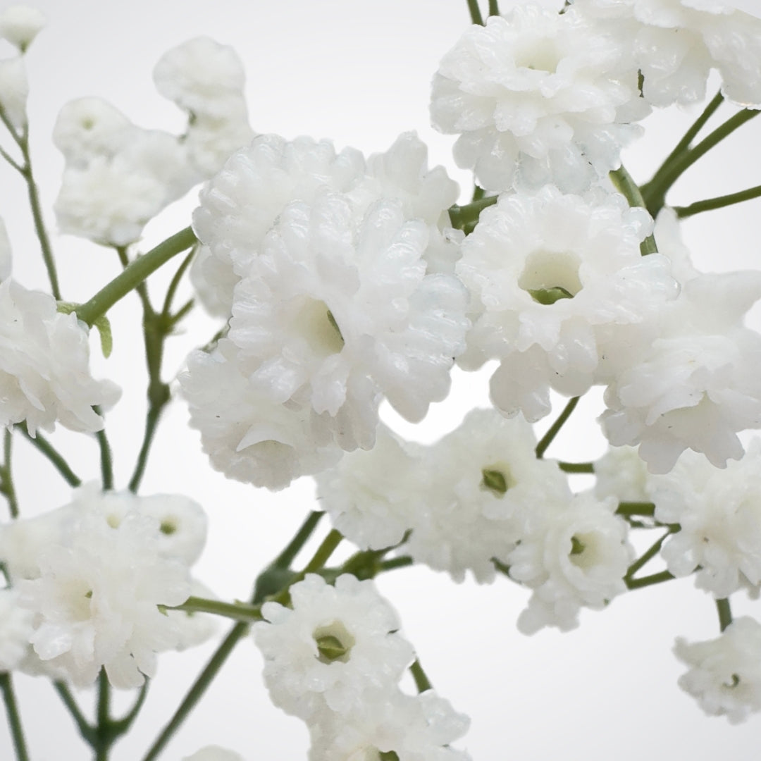 Close up of the white small blooms on a white artificial Baby's Breath flower made by Real Touch, from My Faux Florist Canada