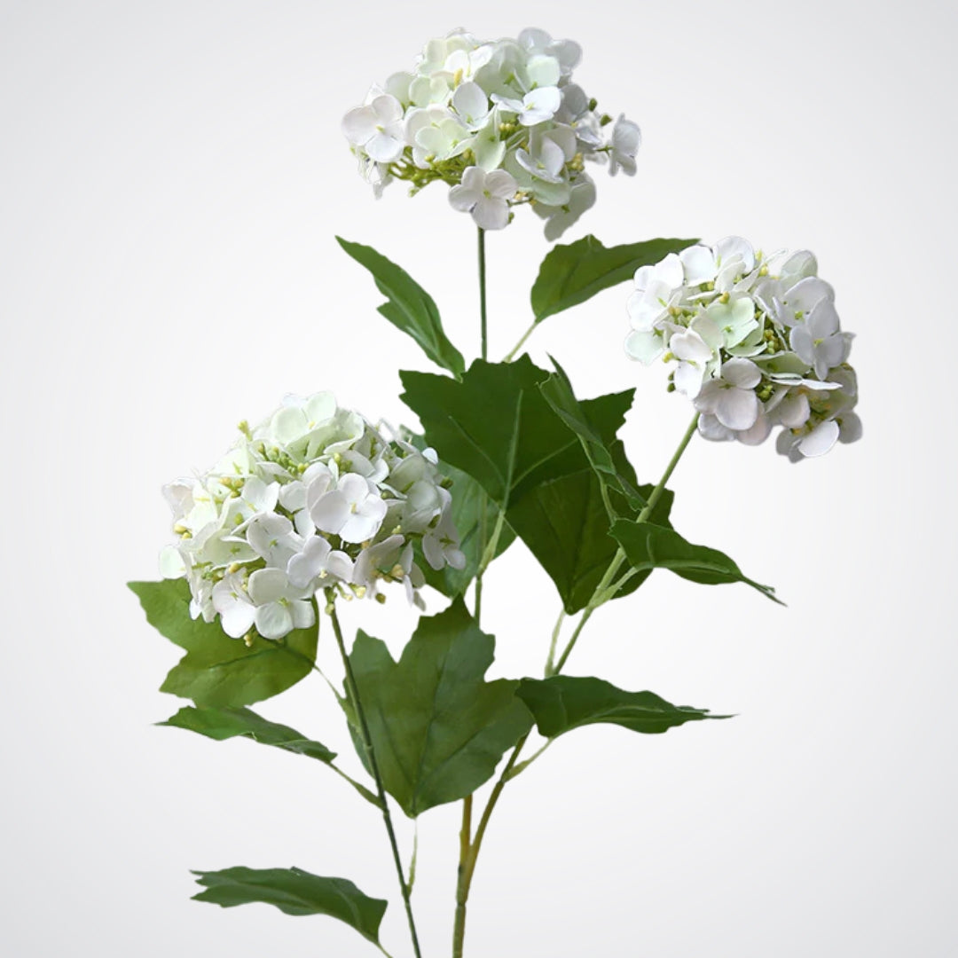 Detailed full view of a white realistic artificial hydrangea stem with realistic Real Touch petals, from My Faux Florist artificial flowers Canada.