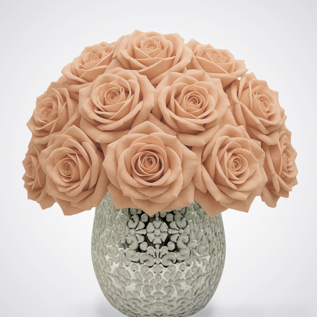Bouquet of peach artificial roses made of foam in a textured vase on a white background from My Faux Florist Canada.