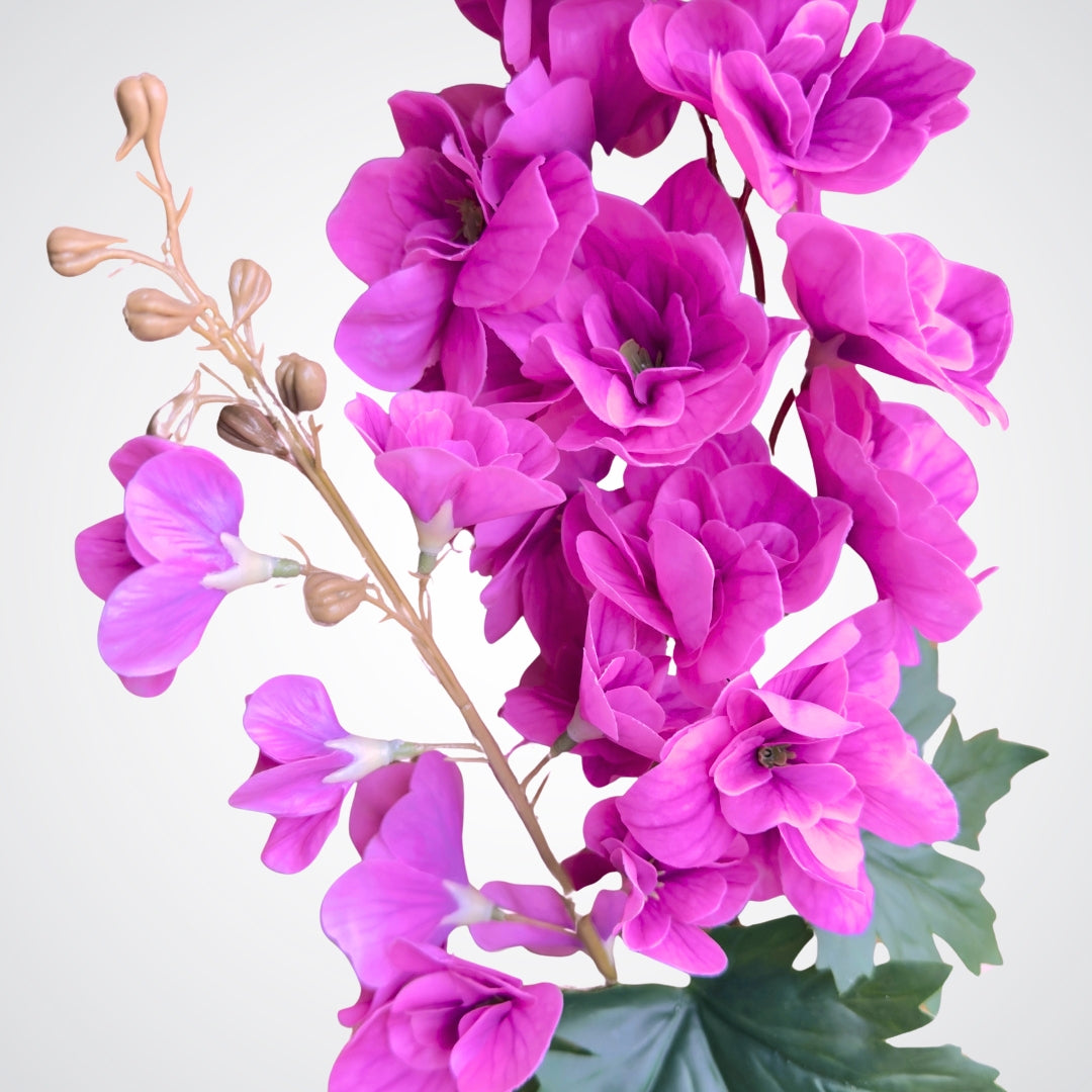 Close up view of a fuchsia artificial delphinium flower with lifelike Real Touch details, by My Faux Florist Canada