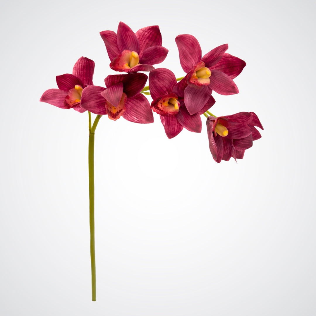 Burgundy artificial orchid stem on a white background, from My Faux Florist Canada