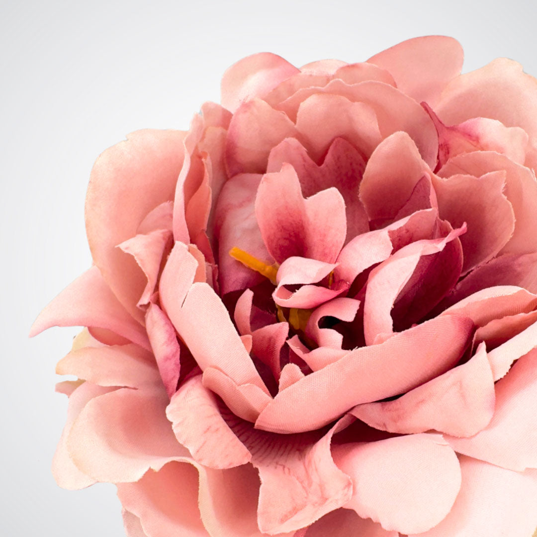 Close up view of a single flower bloom head on an antique pink artificial peony bush from My Faux Florist Canada