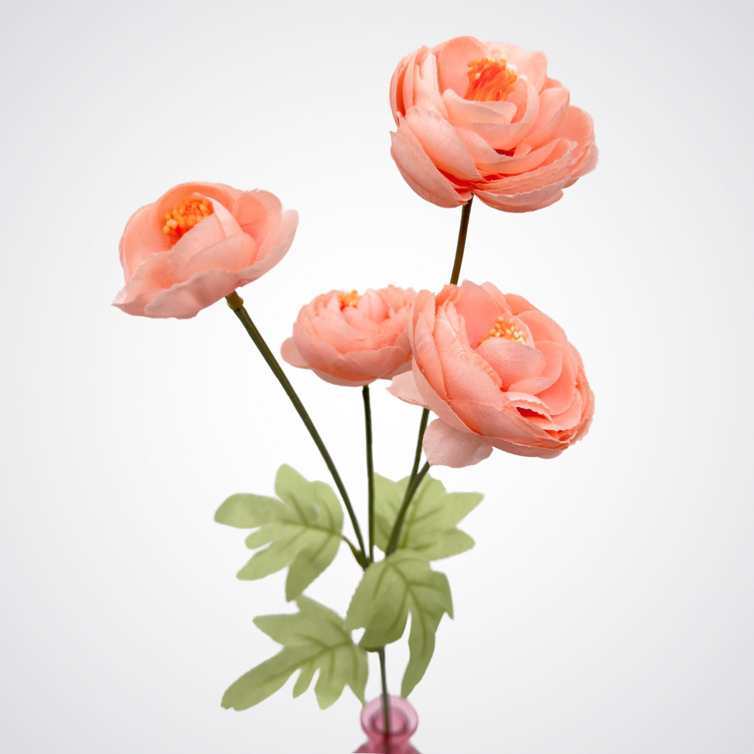 Close up of the 4 bloom heads on one stem of a pink artificial rose, by My Faux Florist artificial flowers Canada.