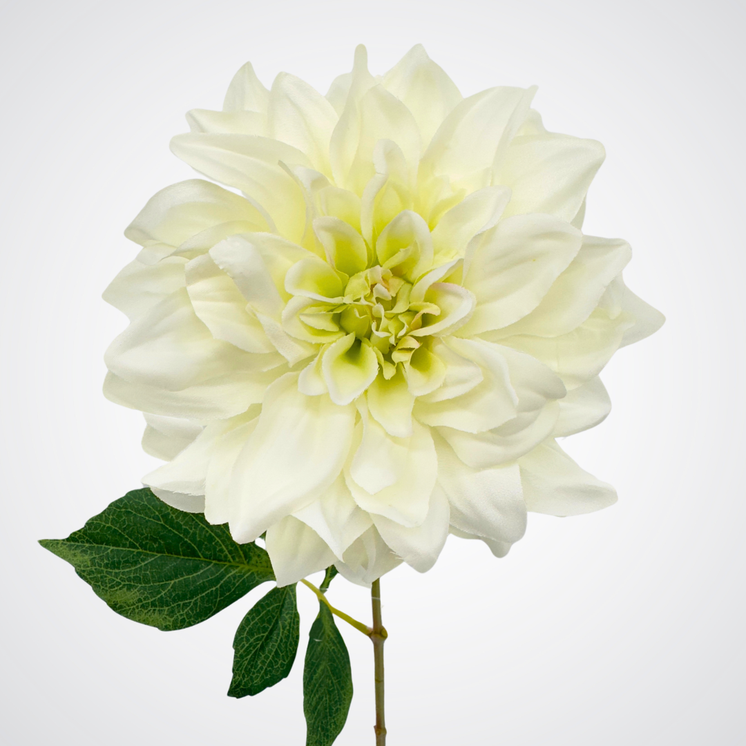 Close up of bloom on a white artificial dahlia flower on a gray background from My Faux Florist Canada.