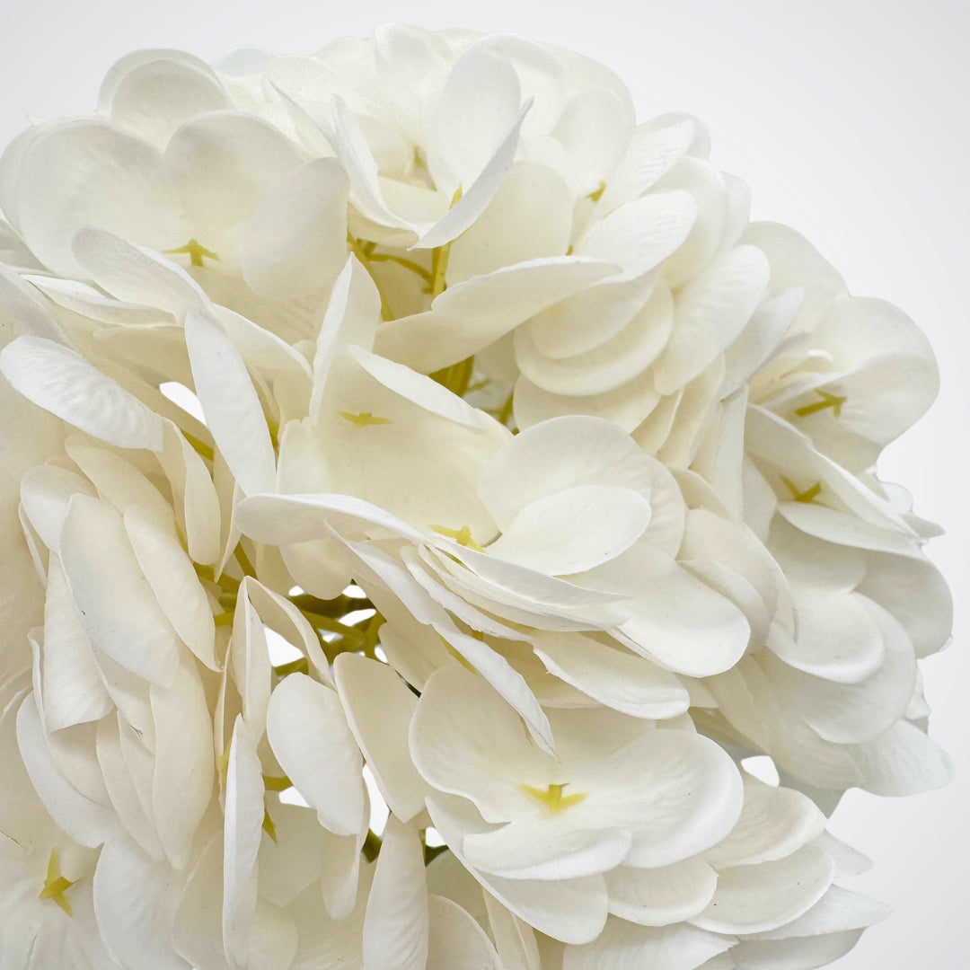 Close-up of white artificial hydrangea bloom showing layered Real Touch petals