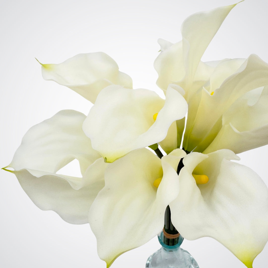 Close up of a bouquet of white realistic artificial lilies with realistic Real Touch petals, from My Faux Florist artificial flowers Canada.