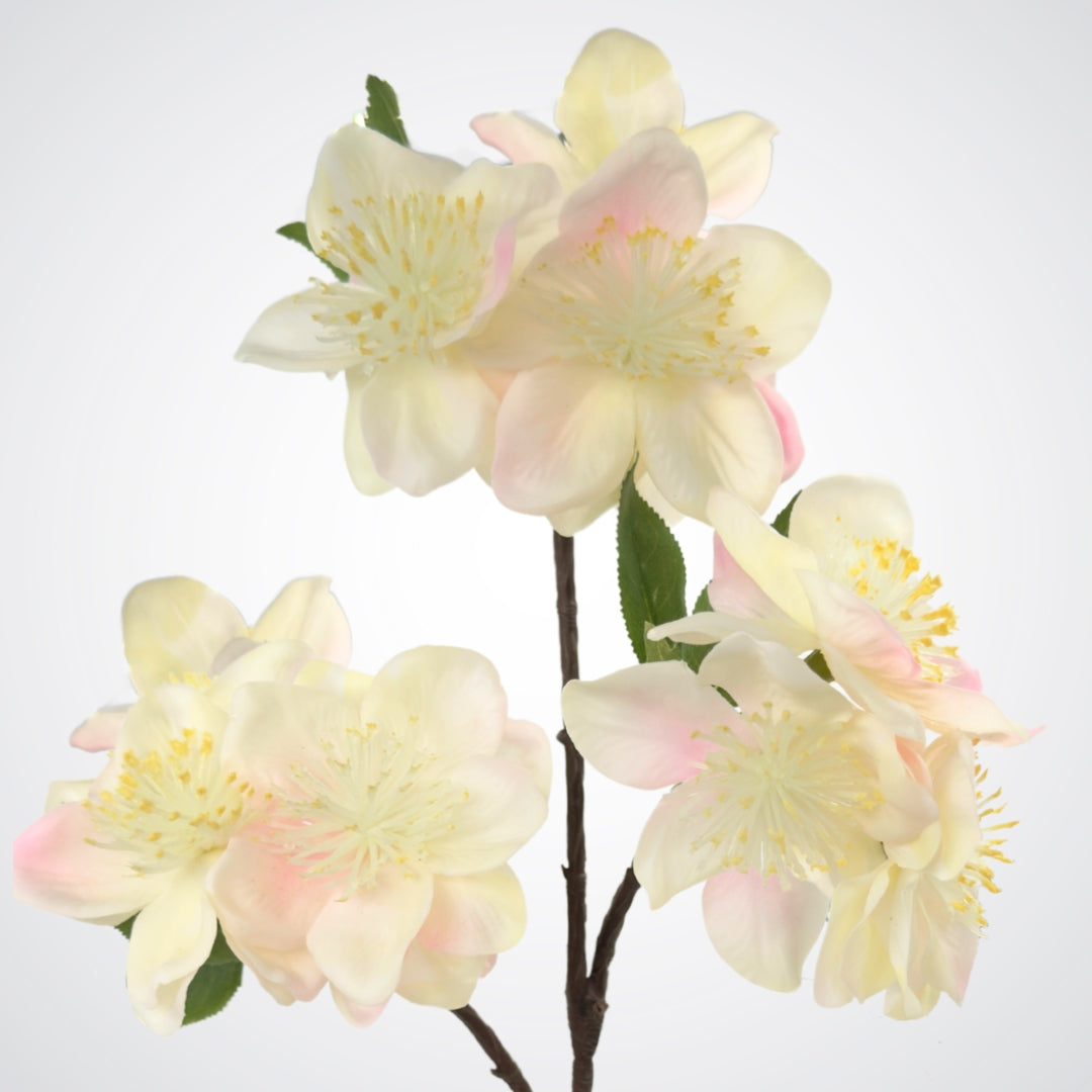 Close up view of 3 blooms on an artificial apple blossom branch with ivory white blooms and soft yellow pollen tips.  The petals are Real Touch and detailed, by My Faux Florist Canada