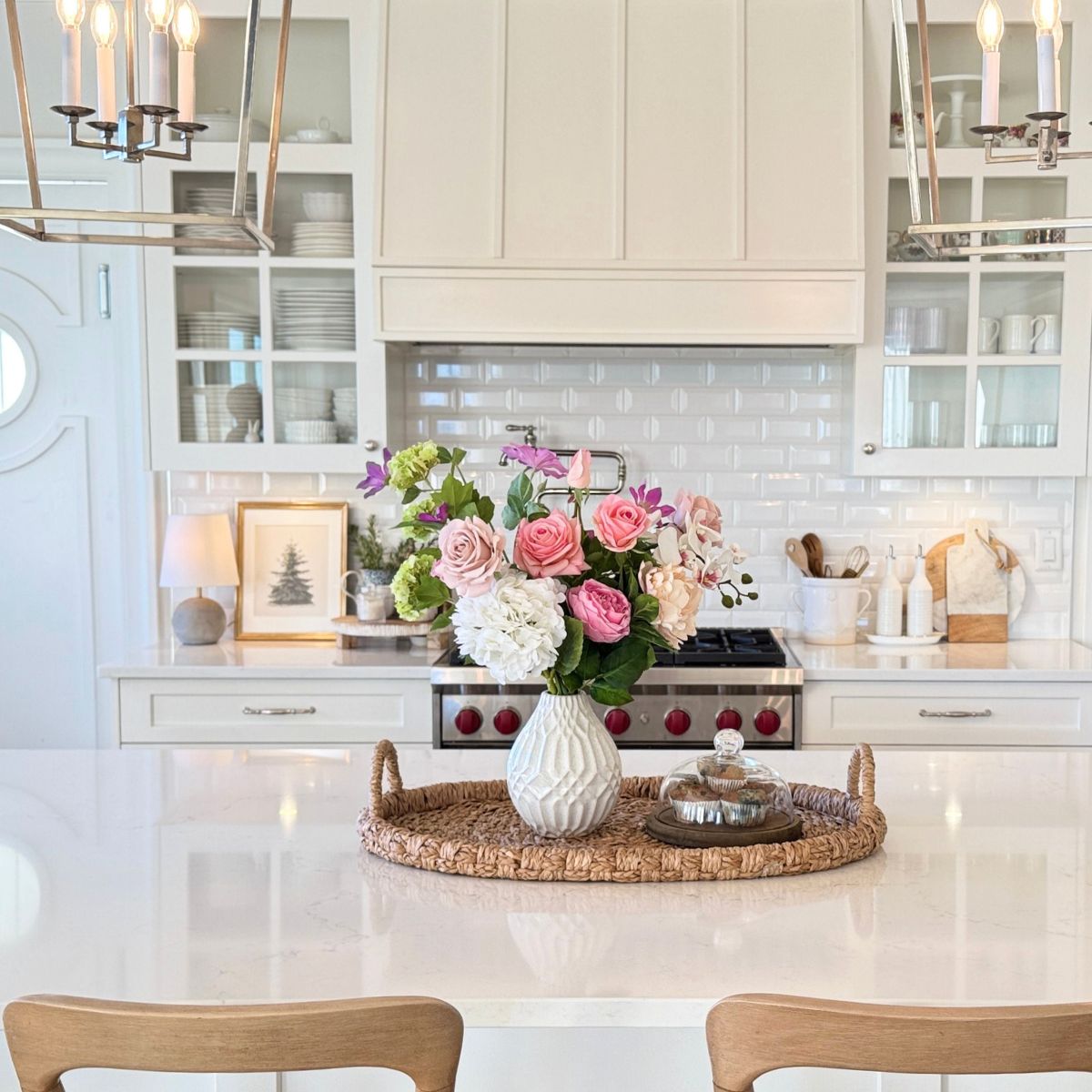 Kitchen with a decorative faux floral arrangement of realistic artificial flowers on the counter  for My Faux Florist Canada