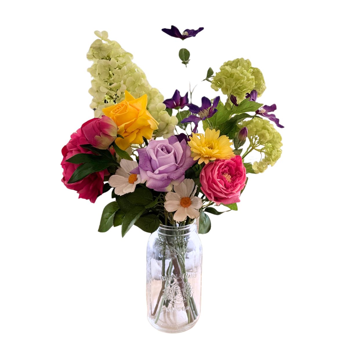 Bouquet of colorful artificial flowers in a glass vase on a white background  for My Faux Florist Canada