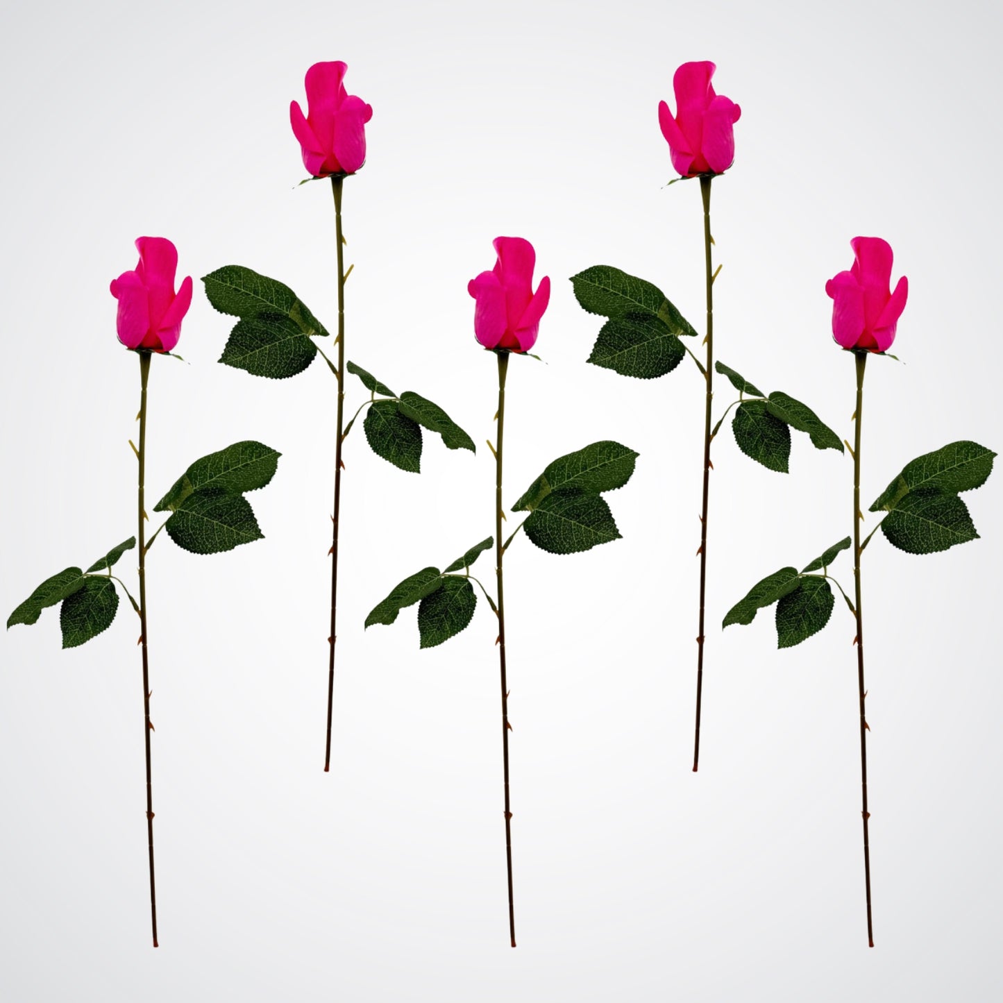 5 bright pink artificial roses with green leaves on a white background from My Faux Florist Canada