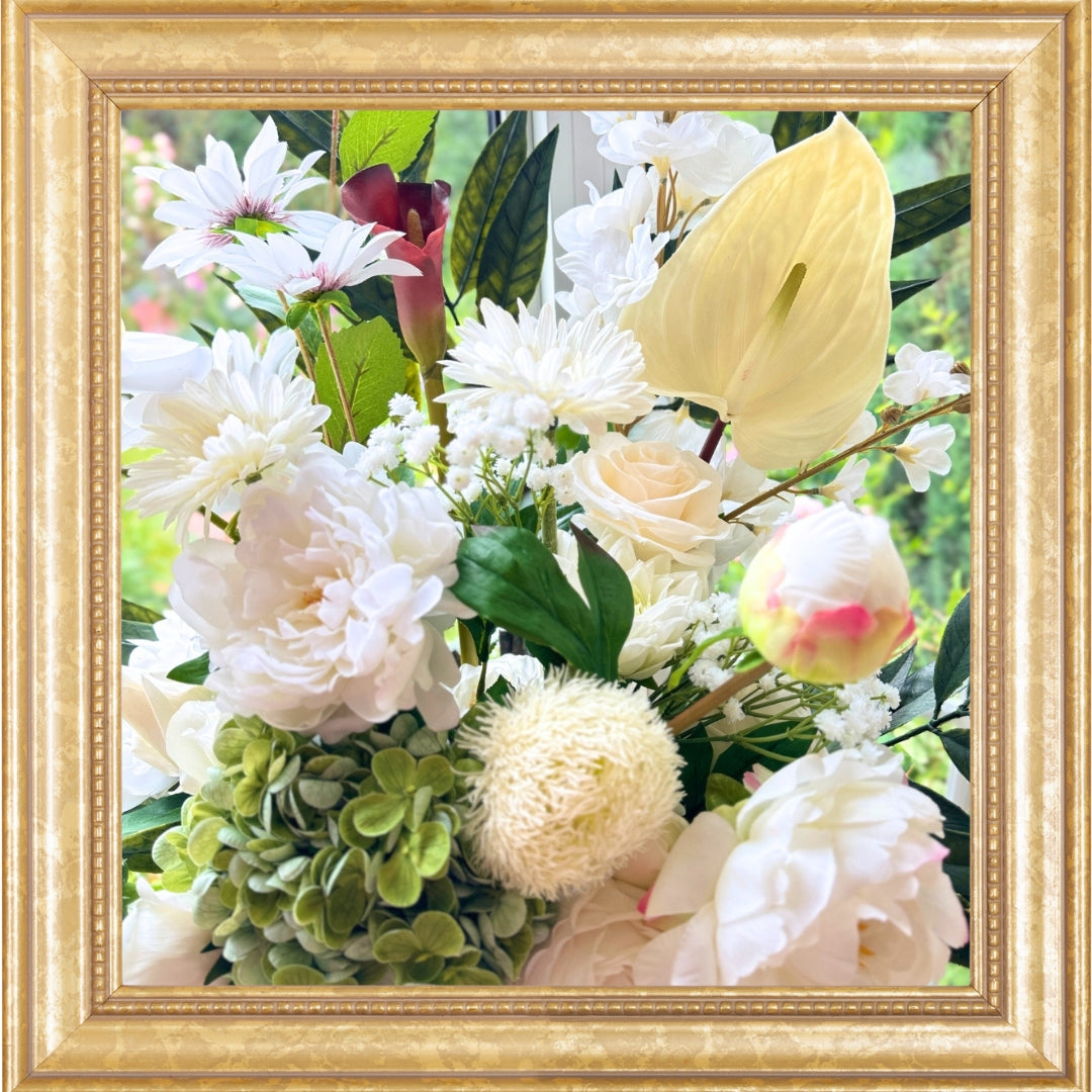 close up of artificial flowers in neutral whites and greens