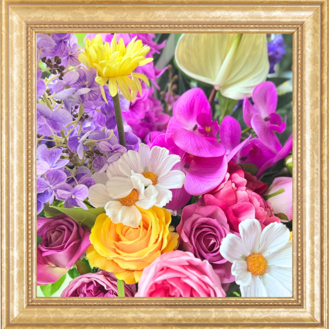 close up phot of fake flowers in bright happy colours