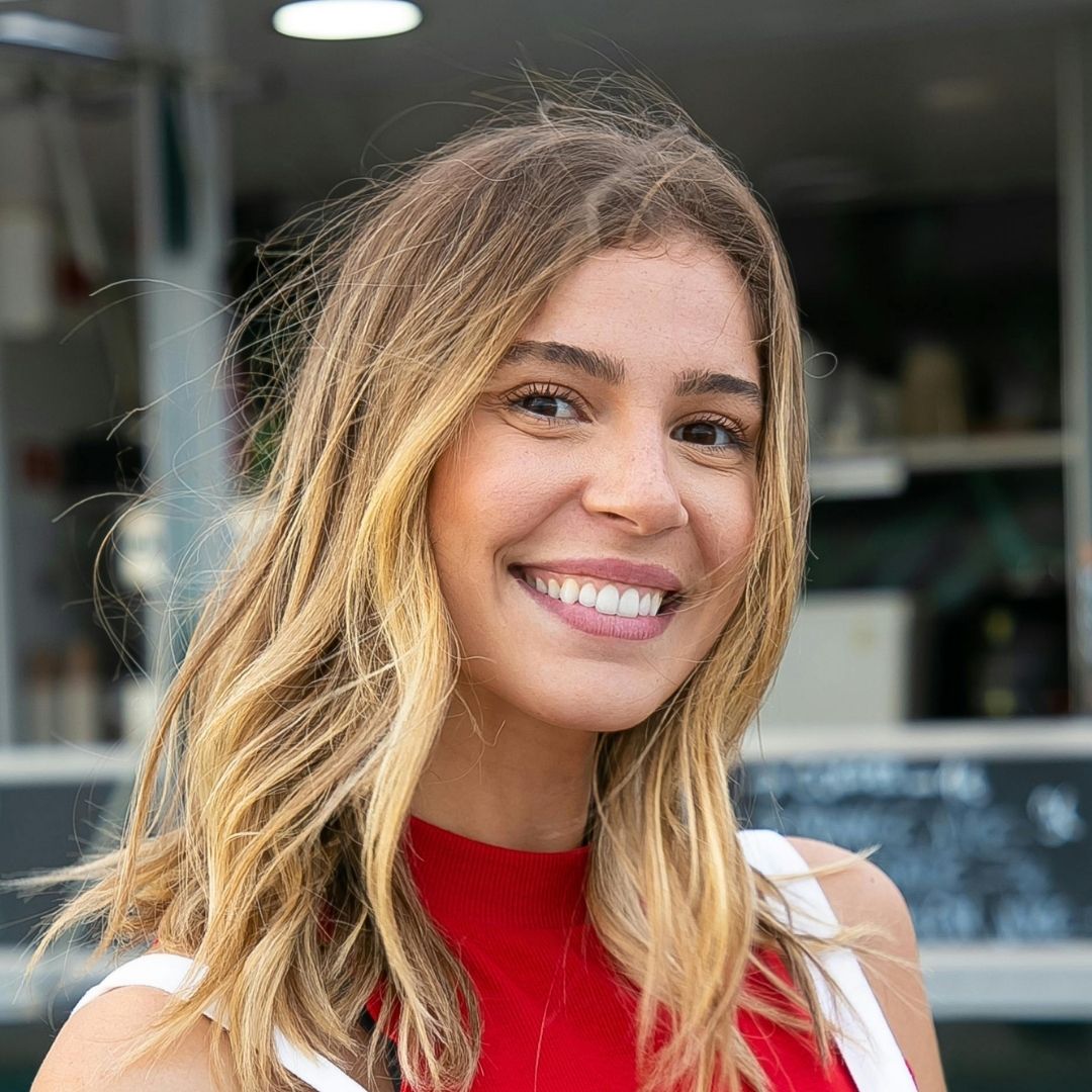 Artificial Flowers Canada. Smiling customer who left a fake flower product review for My Faux Florist.