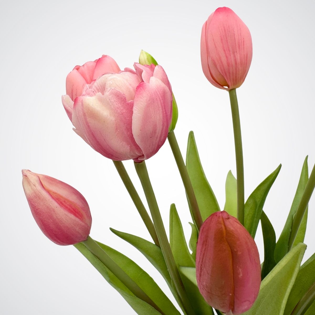 Bouquet of pink artificial tulips on a light gray background, for My Faux Florist Canada