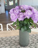 Video of a vase full of realistic artificial roses, purple flowers, in a living room, for My Faux Florist Canada
