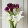 Turntable showcasing a realistic artificial flower bouquet for bridesmaids featuring deep plum artificial calla lilies, white artificial calla lilies, and purple artificial tulips — a modern and elegant design from My Faux Florist Canada.