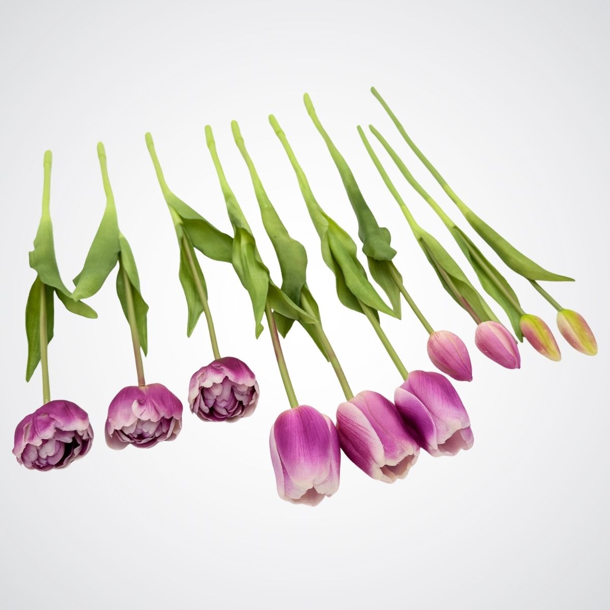 Purple artificial tulips on a light gray background, for My Faux Florist Canada