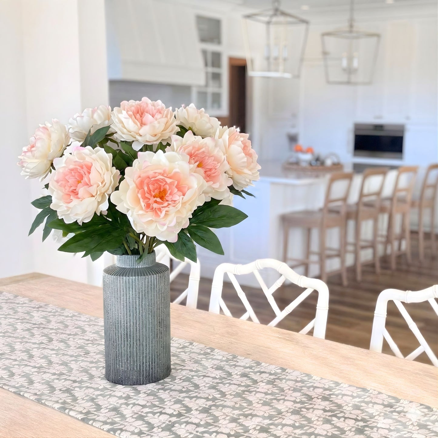Bouquet of pink realistic artificial peonies on a kitchen table, for My Faux Florist Canada