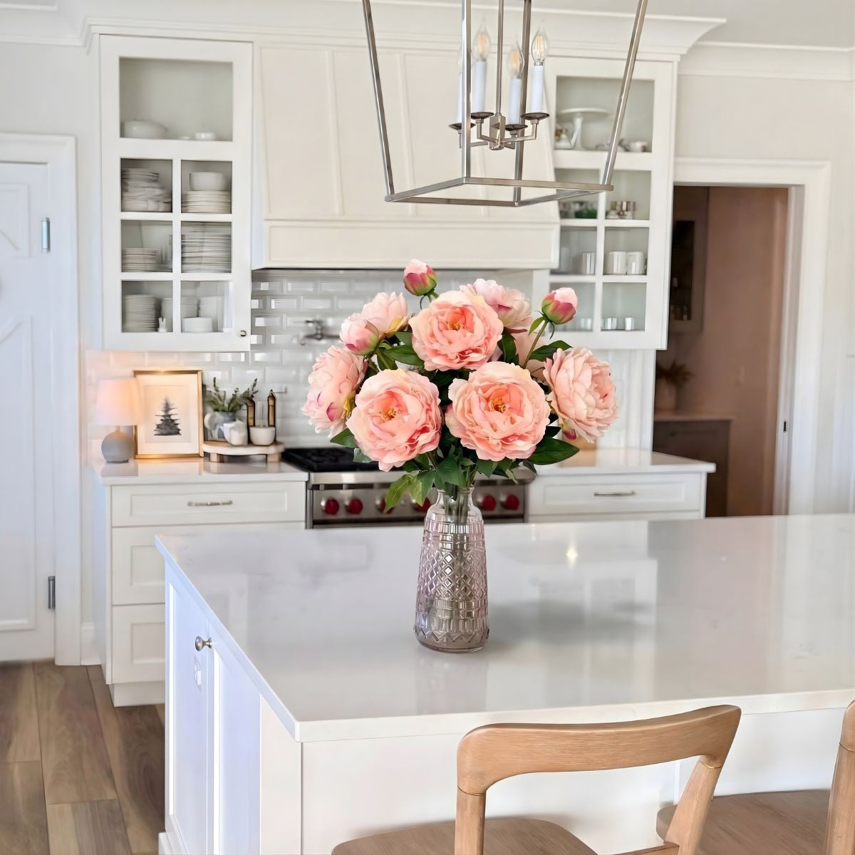 Kitchen with a vase of pink realistic artificial peonies on a counter, for My Faux Florist Canada.