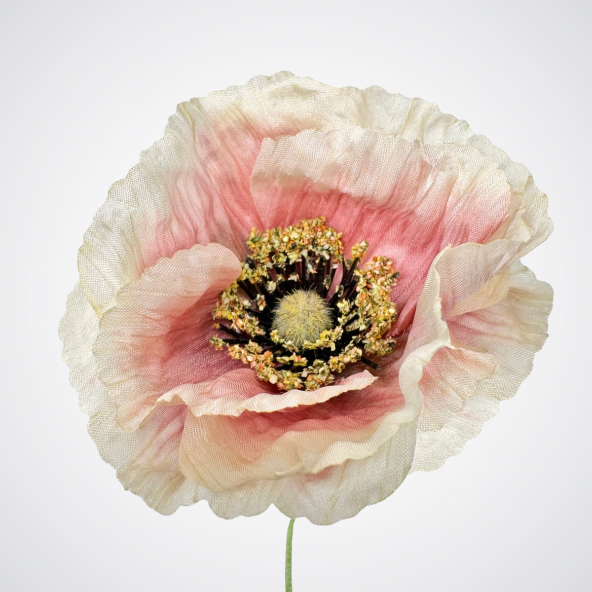A single artificial silk poppy flower with ruffled off-white petals tinged pink, a dark center, and yellow-green stamens on a plain light gray background. For My Faux Florist Canada.