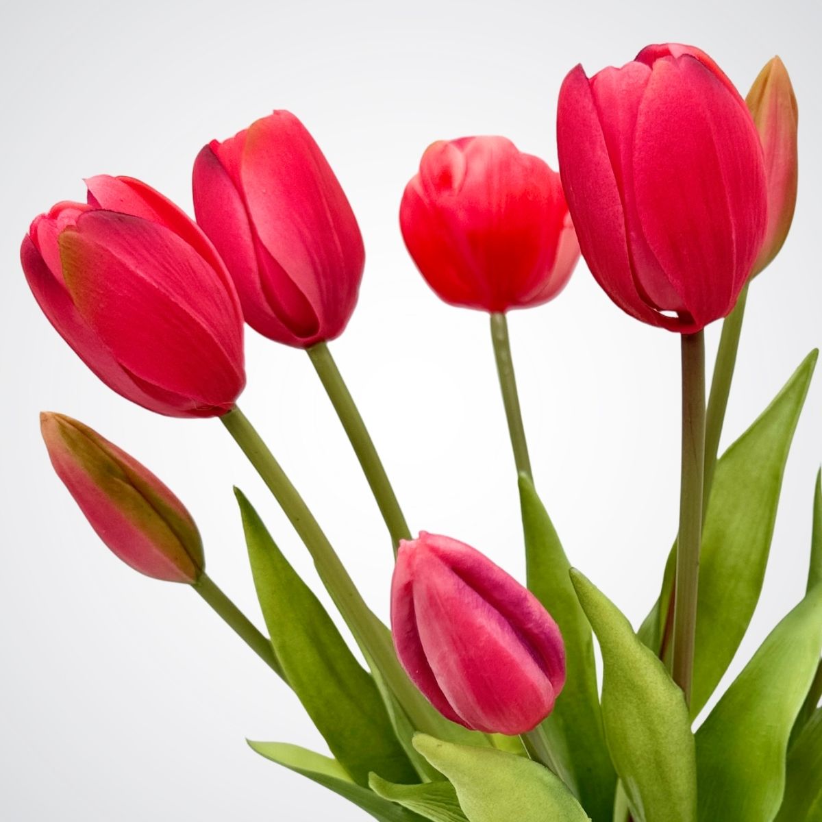 Bouquet of dark pink artificial tulips on a light gray background, for My Faux Florist Canada