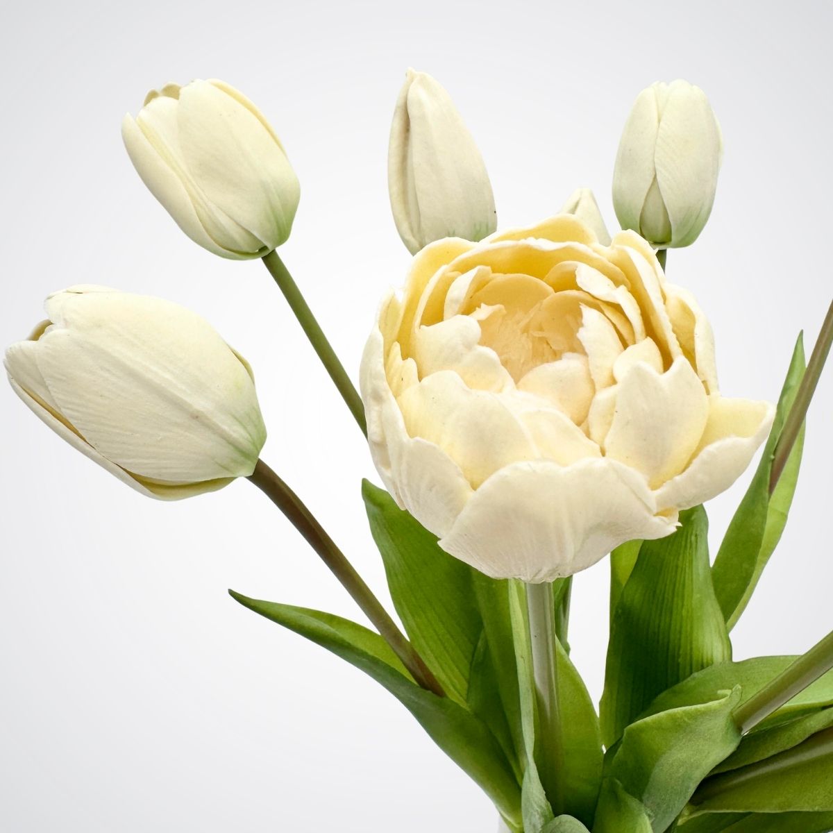 Bouquet of white artificial tulips on a light gray background, for My Faux Florist Canada
