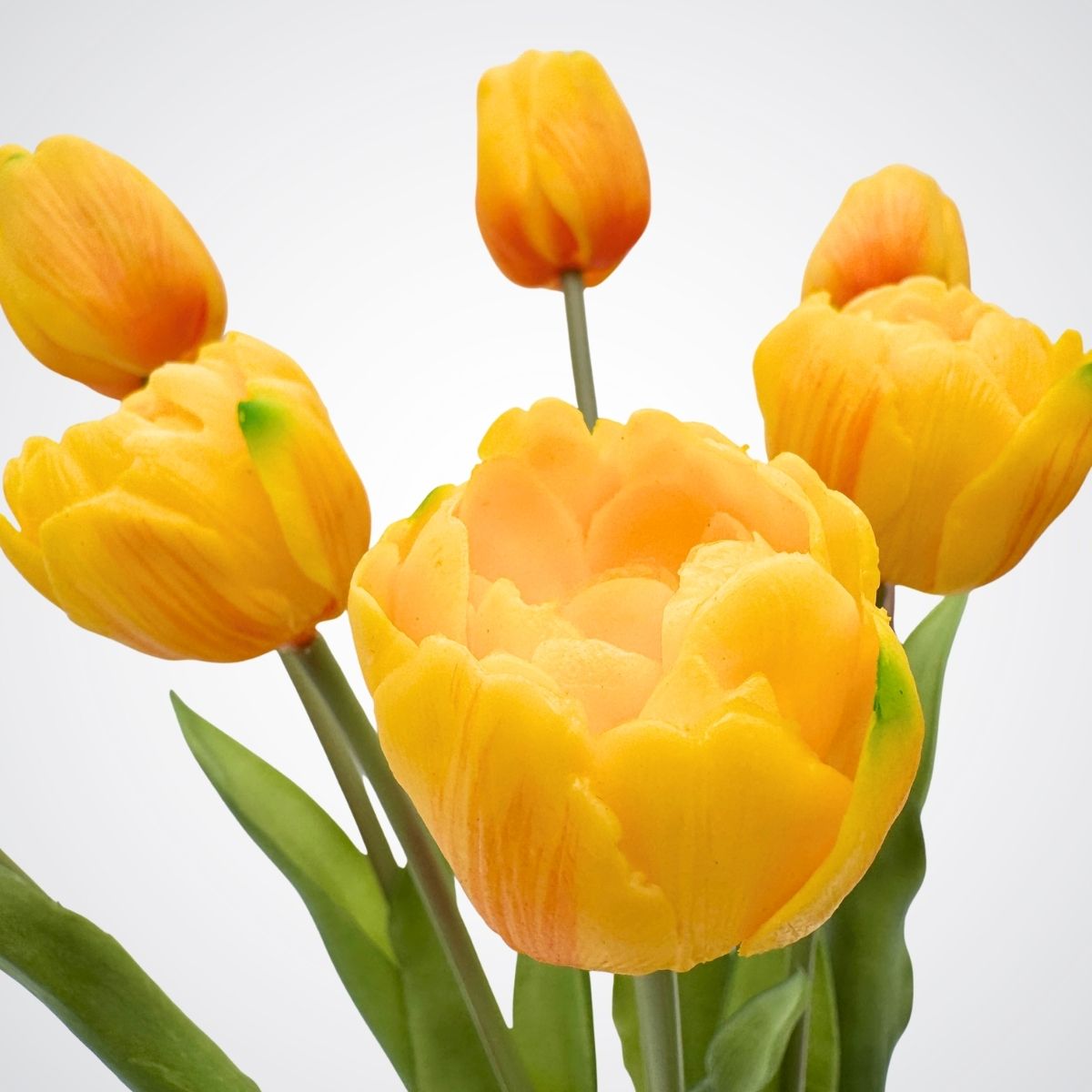 Bouquet of yellow artificial tulips on a light gray background, for My Faux Florist Canada